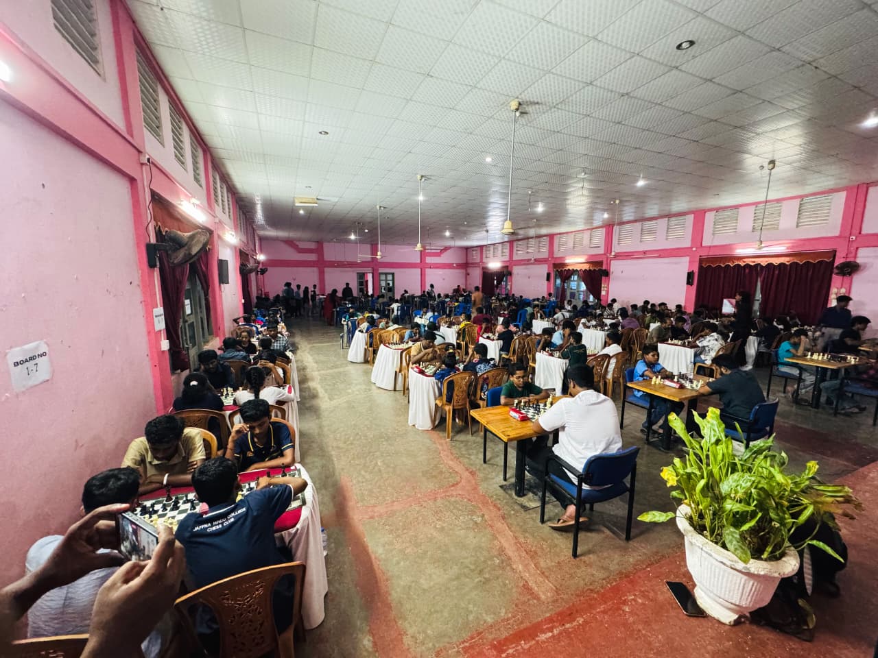 Players competing inside the Co-Operative Cultural Hall in Kilinochchi