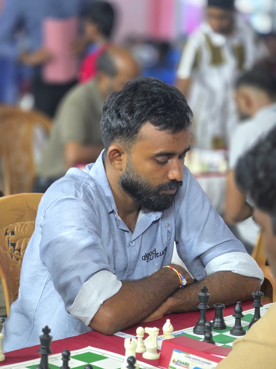 A player concentrating on his game during the tournament